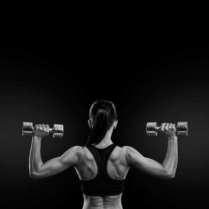 Female personal trainer in Burnley demonstrating strength training and fitness transformation